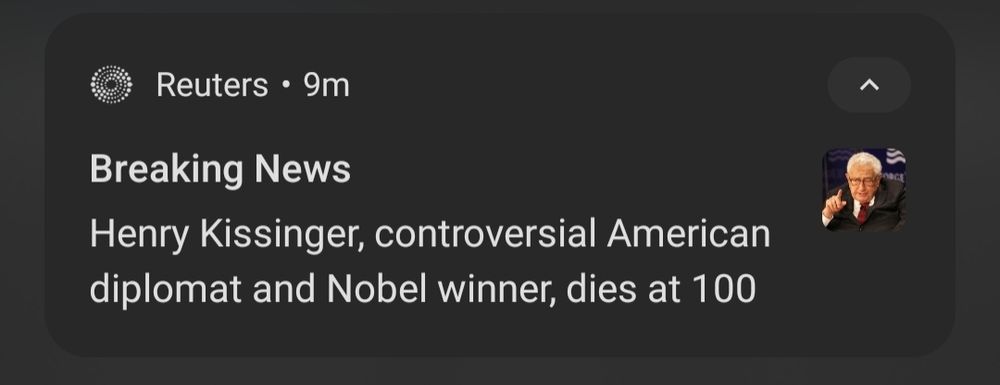 Screenshot of a Reuters news notification reading "Breaking News: Henry Kissinger, controversial American diplomat and Nobel winner, dies at 100"