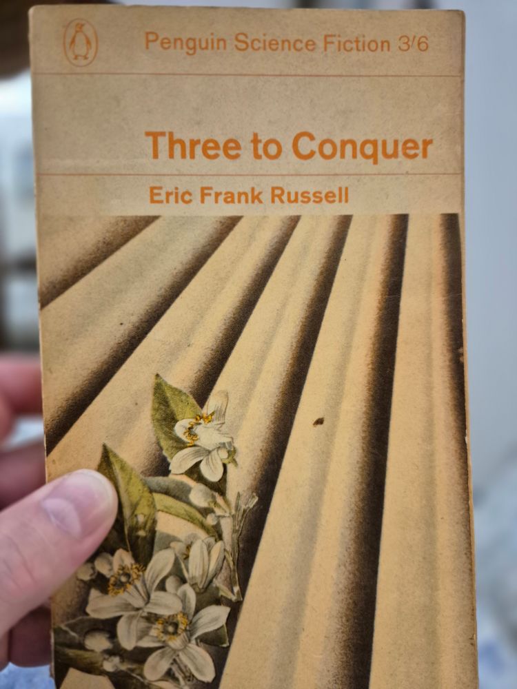 Eric Frank Russell's THREE TO CONQUER (1956). The novel adopts the idiom of 30s Noir hardboiled to tell a story of evil Venusian soul-replacing alien vampire invaders and the one Earthling hero, who happens to have been born a telepath, who can detect when what look like regular humans are actually evil Venys Space Zombies. Accordingly the cover art shows a grid with some clover growing through it. Because... why not?
