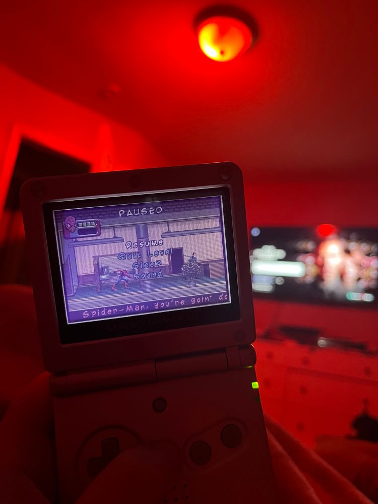gameboy sp with Spiderman 3 game displayed