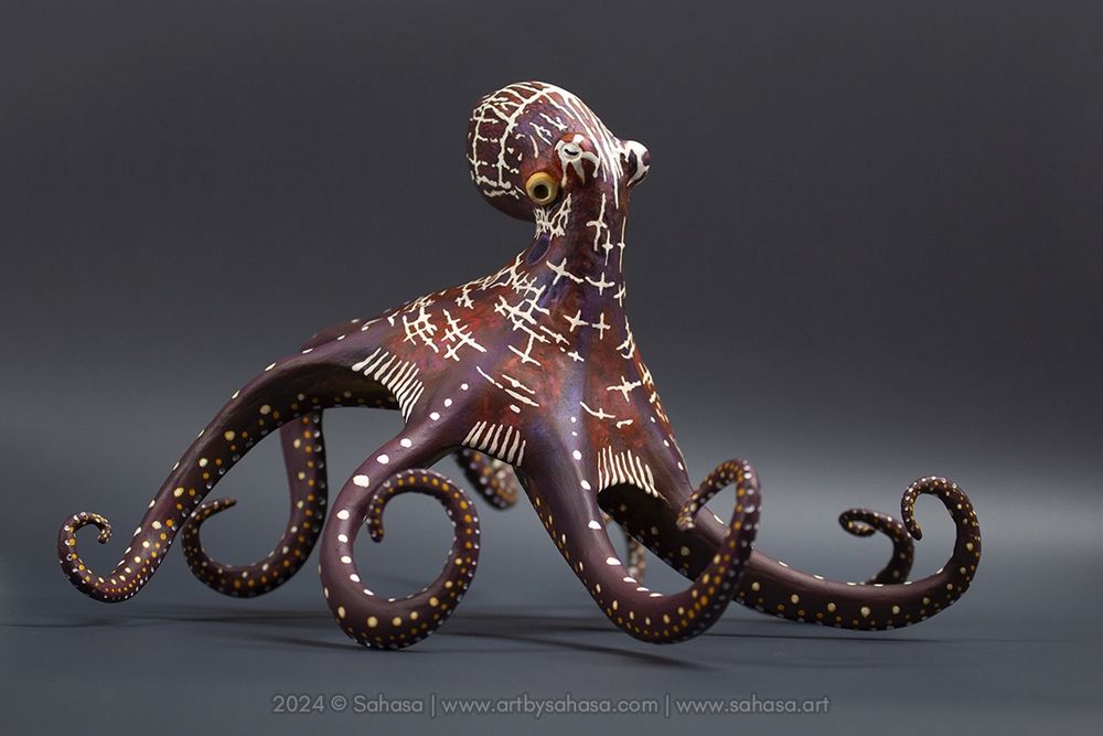 Gloria the Day Octopus, hand sculpted from clay and painted in a somewhat abstract form.
