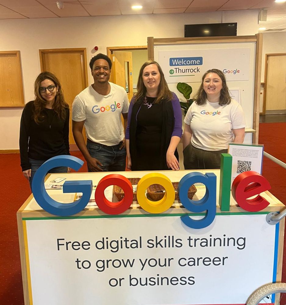 Jen Craft MP stood smiling alongside staff from Google Digital Garage, behind a Google sign. Text on the banner reads: "Free digital skills training to grow your career or business"