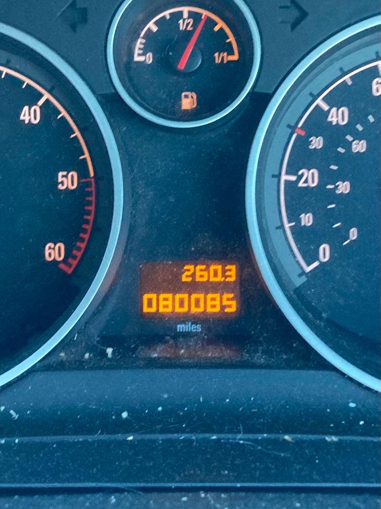 My car odometer displaying the mileage 80085