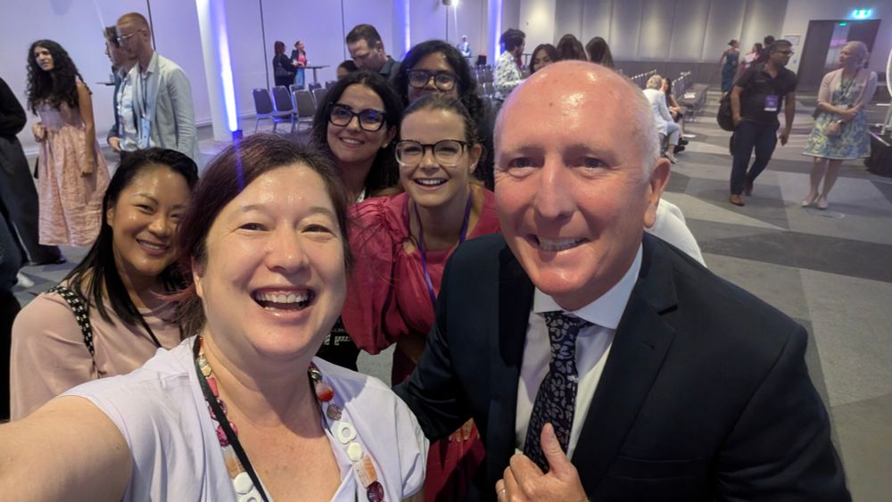 A government minister, a young Australian of the year and a group of smiling developers