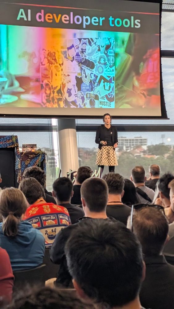 Keynote speaker on stage at a conference 
