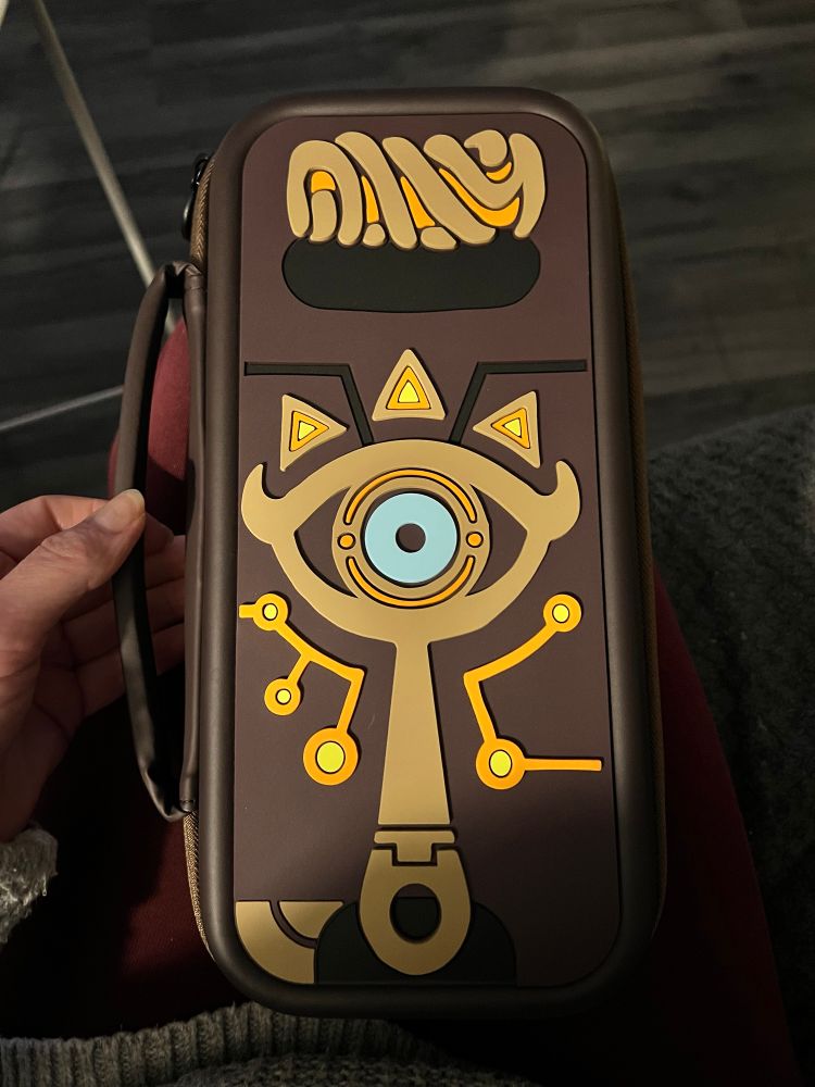 Carry case for the Switch 2. The design is the Sheikah Slate from Breath of the Wild.  