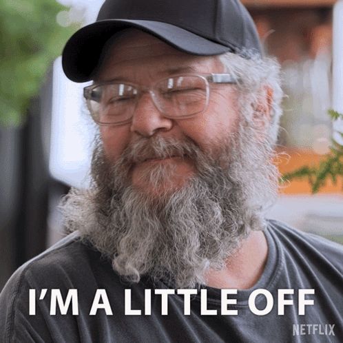 a man with a beard wearing glasses and a hat says i 'm a little off netflix