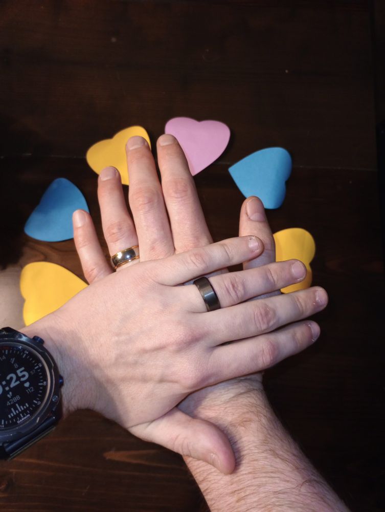Cheetah paw and Balbok hoof sporting new engagement rings.