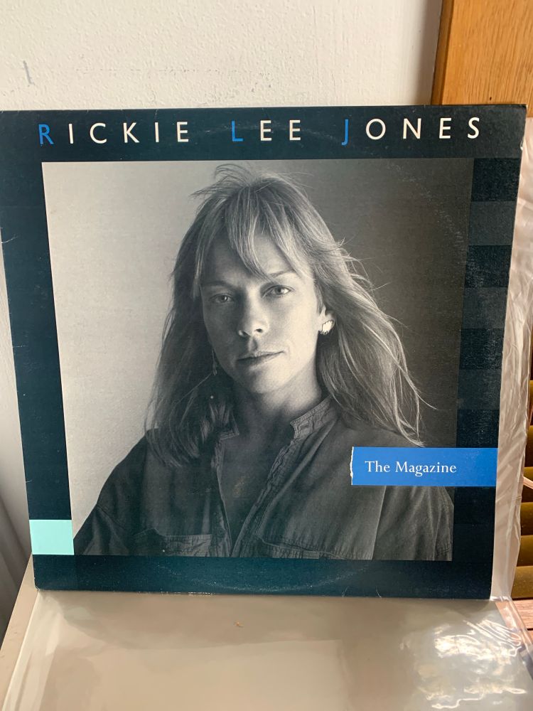 Album cover, b&w portrait of Rickie Lee Jones looking directly into camera 