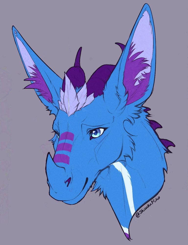 blue dutch angel dragon with white and purple markings and horns