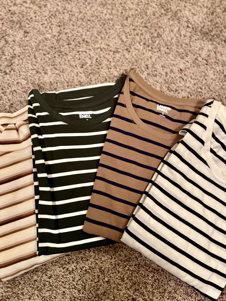 A boquet of various colored striped shirts