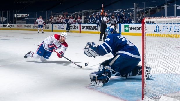 MTL's Paul Byron scores the winning goal against the Leafs, who choked on a 3-1 lead.