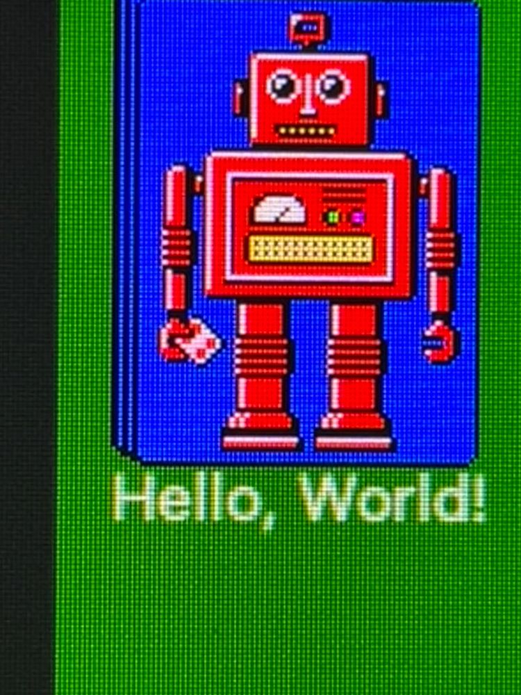 Windows Solitaire robot saying "Hello, World!"