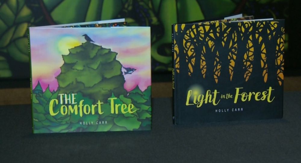 Picture by CTV-Atlantic shows the covers of The Comfort Tree and Light in the Forest by Nova Scotia artist and author Holly Carr. 