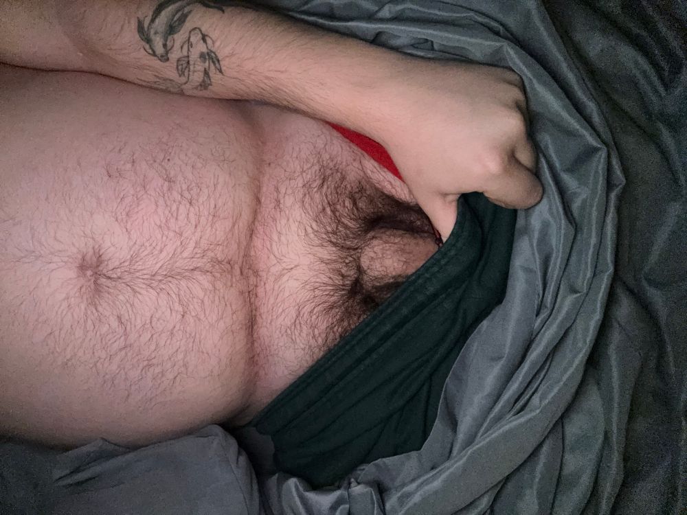 NSFW pulling waistband down showing part of 🍆