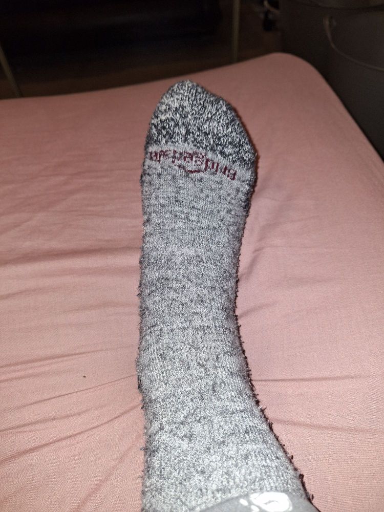 Grey sock on a foot