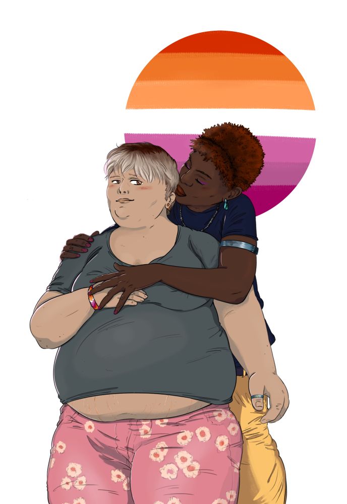 Lesbian couple infront of cicular lesbian pride flag. One is black, one white. The taller one is embracing the shorter one from behind, who is resting one hand on their belly. The black woman is skinny, the white person is fat. The skinny one is wearing elaborate jewlery, baggy yellow pants and a dark t, the fat one is wearing a greay t and pink pants with a flower print.
