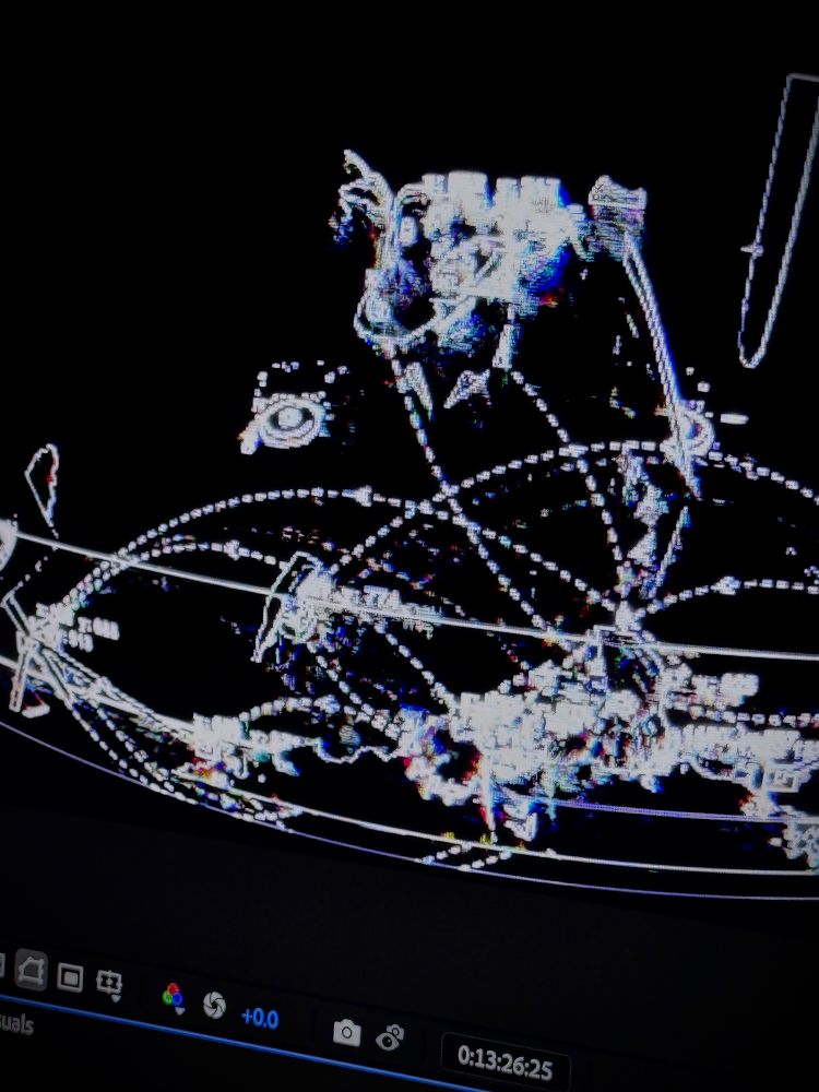 Picture of a screenshot in Adobe After Effects. The effects used make the photo look like it is on a glitchy LED screen, with tracking boxes and arrows pointing to various parts of the image.