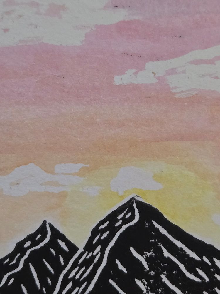 pink and yellow sunset linolium block print with mountains
