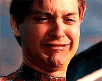 Tobey Maguire face crunched up, sobbing like a baby in his super suit. 