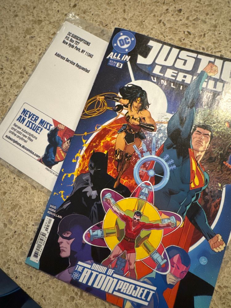 Justice league unlimited #3 sits on top of the subscription mailer card.