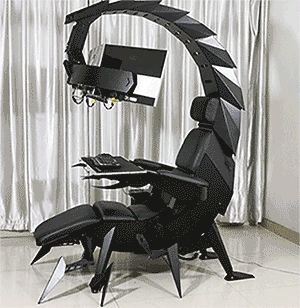 a chair that looks like a scorpion with a computer on top