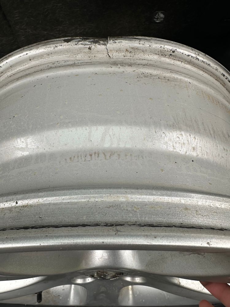 A broken alloy wheel. 
