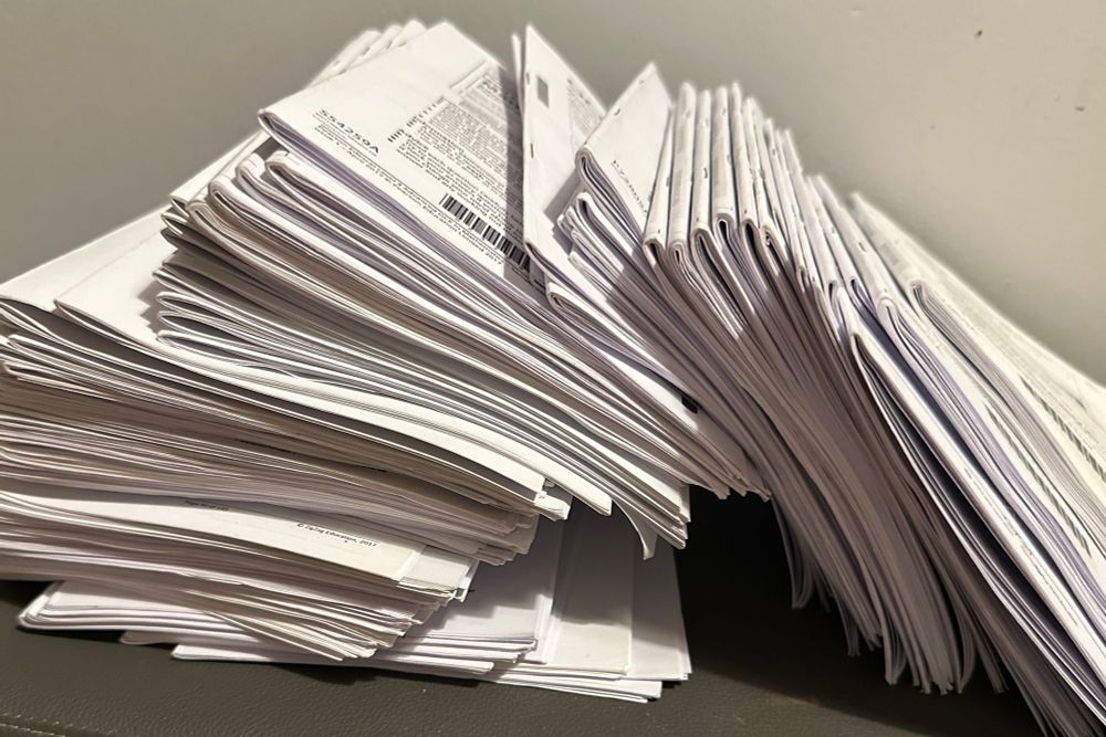 A large stack of exam past papers 