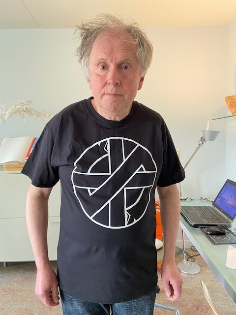 Crass logo T-shirt, present of Charlie Harper