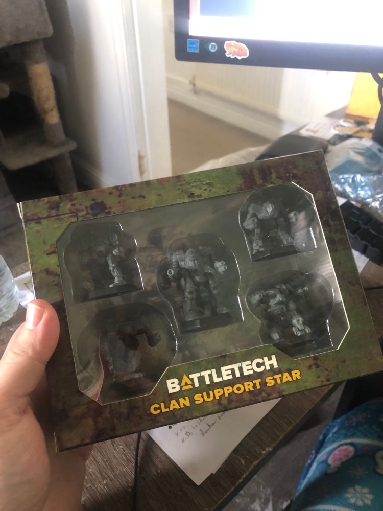 A photo of a Catalyst Games Lab box set of five Battletech miniatures, labelled Clan Support Star.