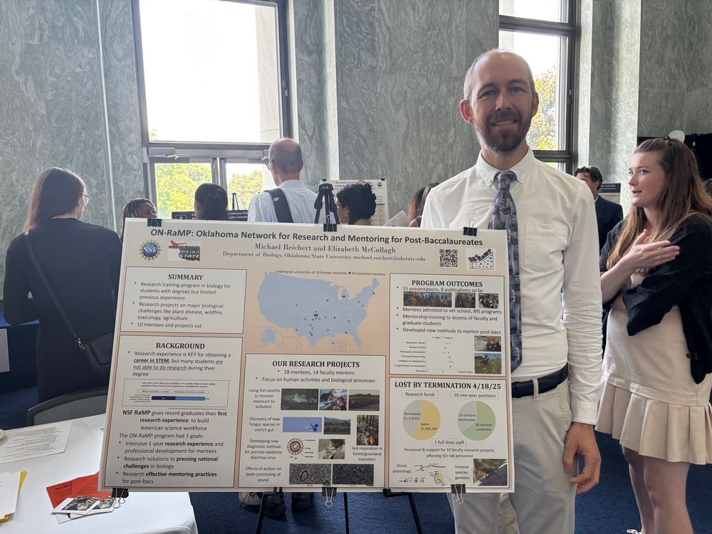 Dr. Reichert standing behind his poster on his cancelled On-Ramp training program.