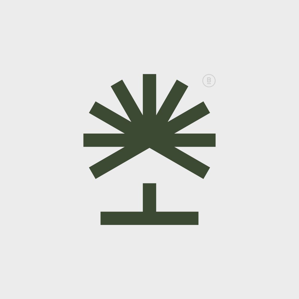A modern logo that combines tree branches and a negative space house in a minimalist style.