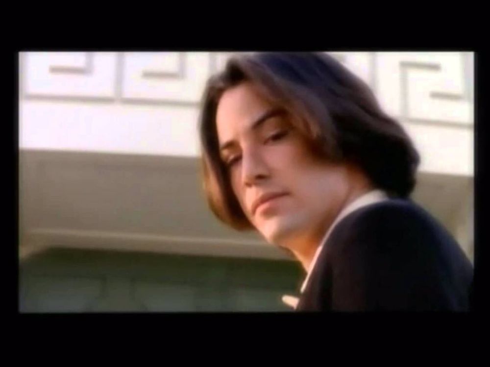 Keanu Reeves in the "Rush Rush" video. 