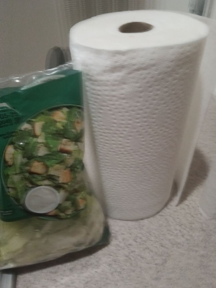 Salad bag compared to standard roll of paper towel. It's about the size of the roll roughly.