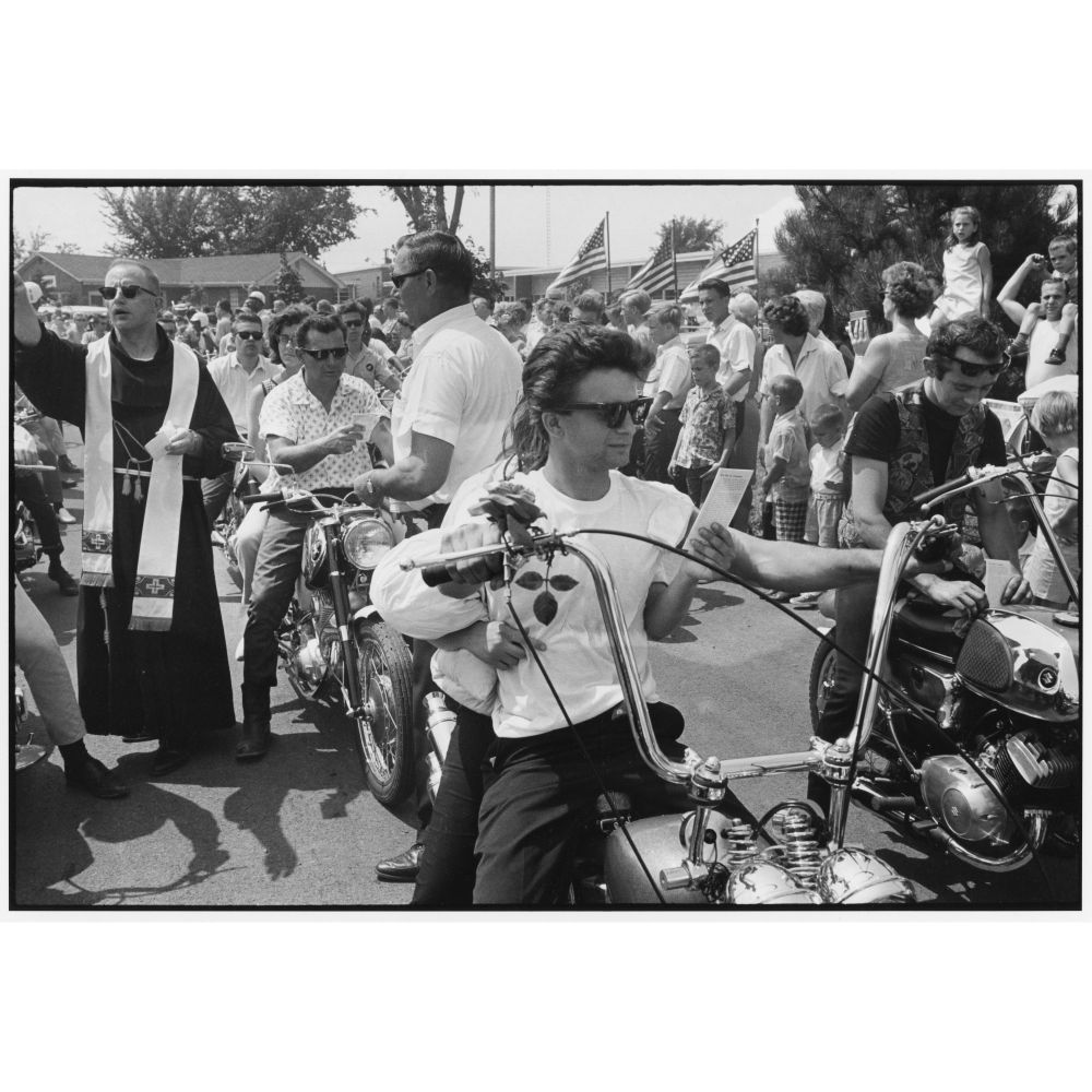 Lot 87, Danny Lyon photograph, Seventeenth Annual World's Largest Motorcycle Blessing, 1966 from the Bikeriders