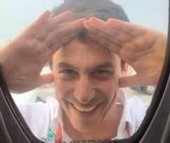 Mercedes F1 Team boss Toto Wolff looking into a window
