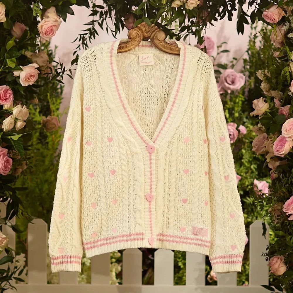The Taylor Swift lover cardigan the loml she is white with pink accents and pink hearts 