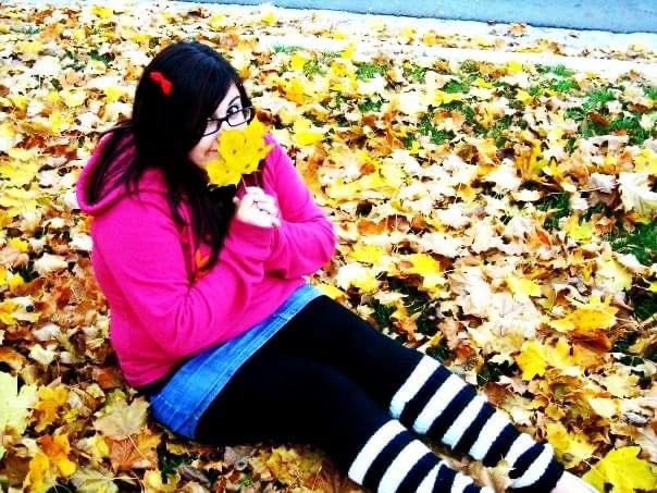 Shelby from the 9th grade in her tamed scene kid phase cause her mom wouldn’t let her do anything to crazy to their appearance. She had a pink pikachu hoodie on with a denim skirt, black leggings and black and white leg warmers. You can’t see my shoes but they had llama’s on them and I have a little red bow in my hair and black thick glasses while holding a leaf by my face cause why 14 year olds are weird 