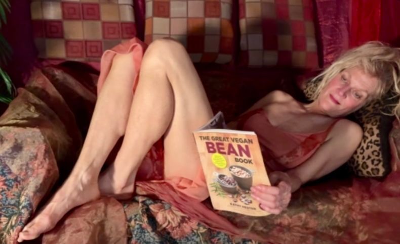 Reclining & reading a bean book, pose from an online life drawing workshop with Bob Burridge.