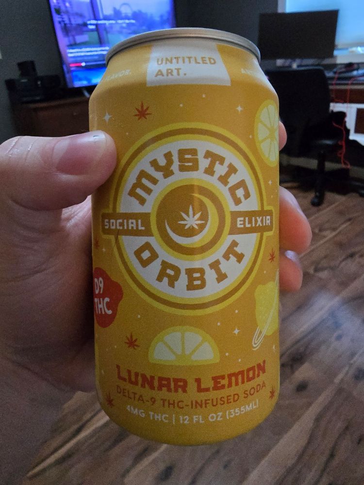 The lemon "mystic orbit" THC soda from Untitled Art.