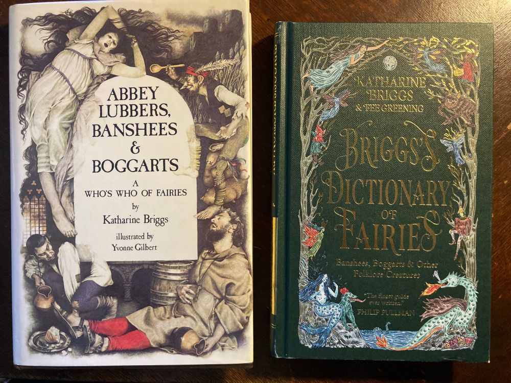 Two books: on the left, Abbey Lubbers, Banshees & Boggarts: A Who’s Who of Fairies by Katherine Briggs; on the right: Briggs’s  Dictionary of Fairies: Banshees, Boggarts & Other Folklore Creature by Katherine Briggs, illustrated by Fee Greening