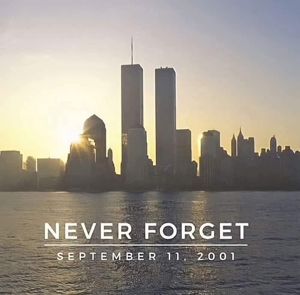 A view of the Manhattan skyline with the twin towers still standing.

Text displays, NEVER FORGET. September 11, 2001 