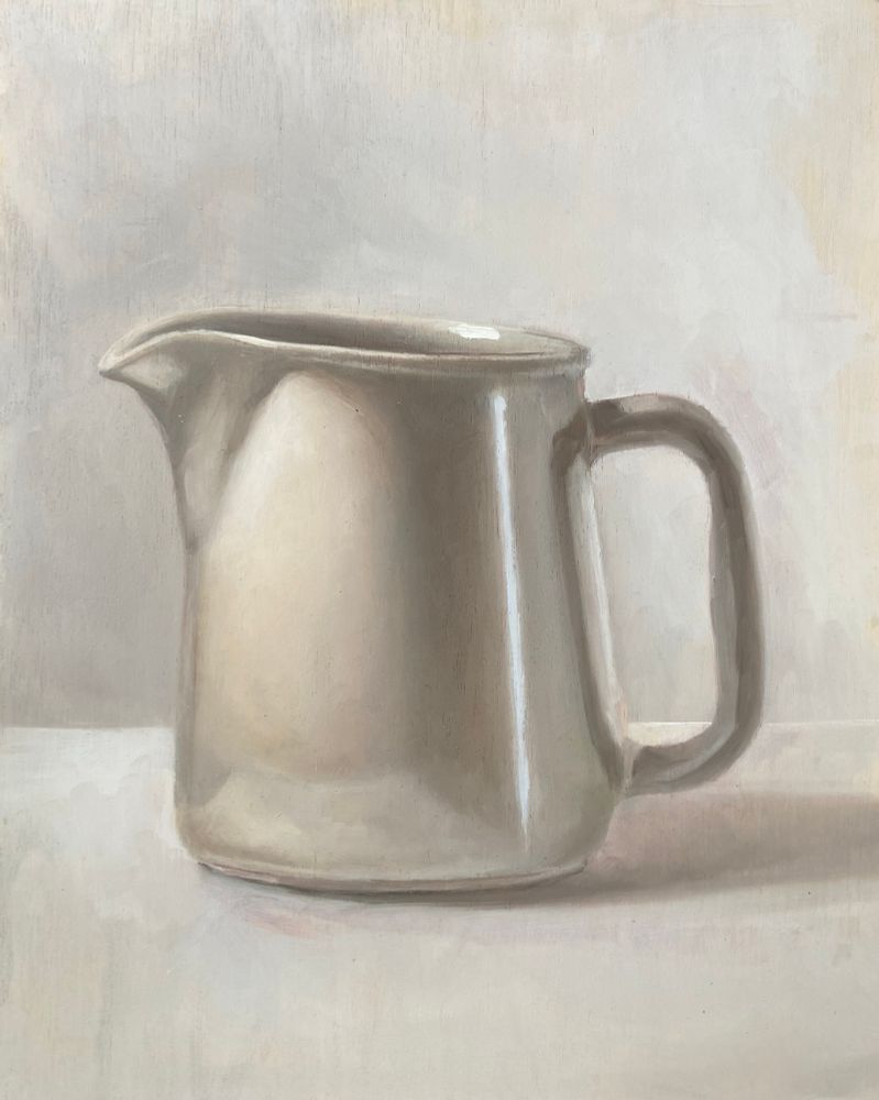 Oil painting of a milk pitcher. The pitcher as well as the background are shades of white and gray. The pitcher sits on a white table and has a bright highlight on it’s right side near the handle. 