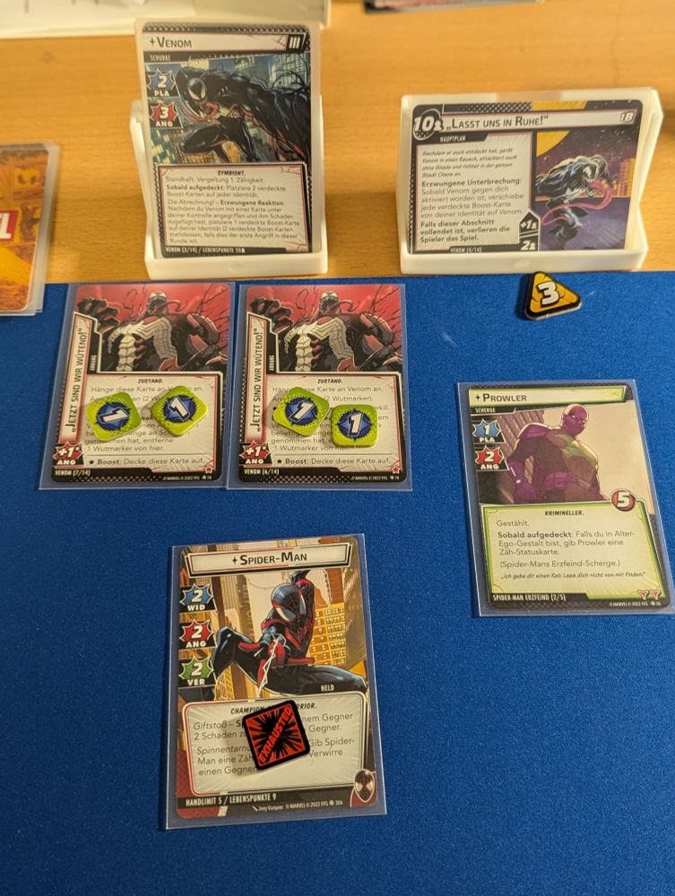 Marvel champions card game showing Spider-Man fighting Venom