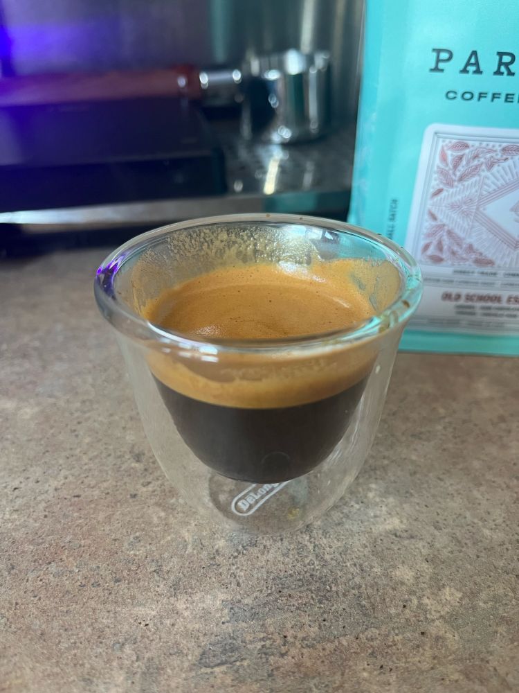 Home made espresso shot in a glass with nice crema