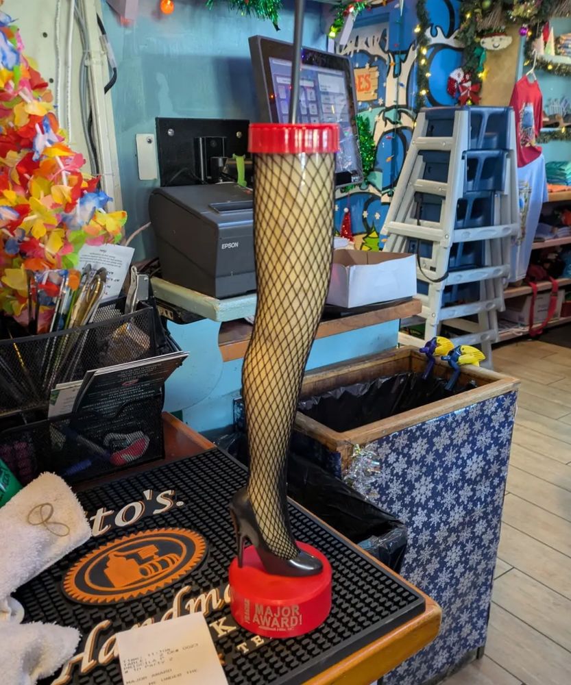 A Major Award: the leg of the leg lamp from Christmas Story, filled with boat drinks and served at your favorite Tiki bar