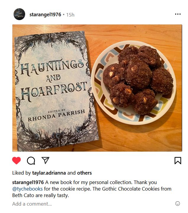 Screenshot of an Instagram post. A reader has baked Gothic Chocolate Cookies from a recipe by Beth Cato, which was a reward for the Hauntings and Hoarfrost Kickstarter Campaign. Also pictured is a physical copy of the Haunting and Hoarfrost anthology, with the Kickstarter exclusive icy blue cover.