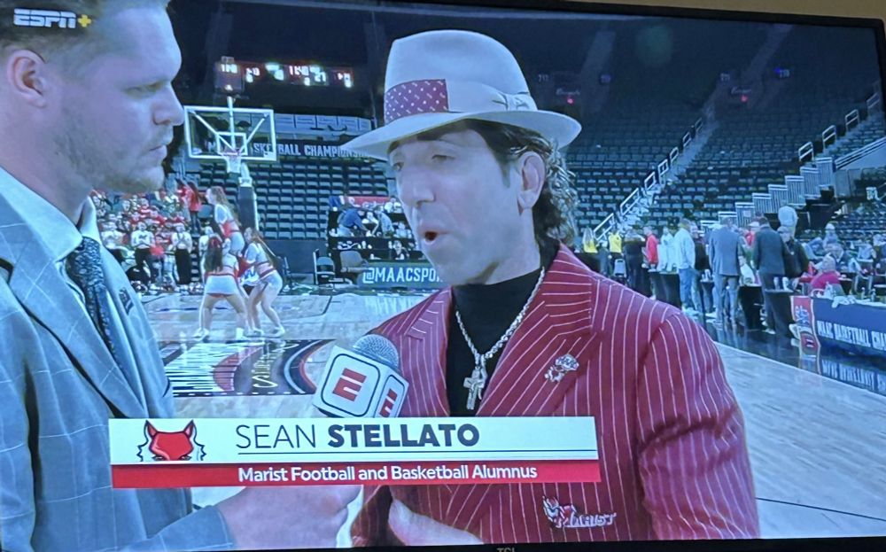 Sean Stellato wearing a Marist pinstripe suit. 