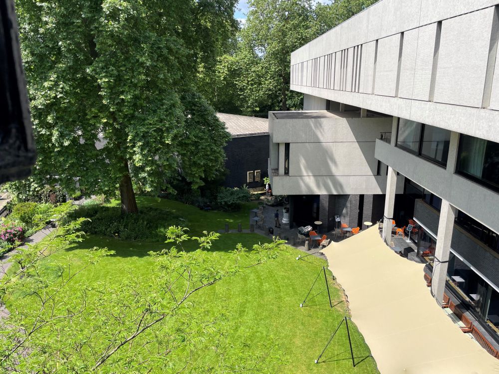A side view of the RCP building and garden in the summer sun.