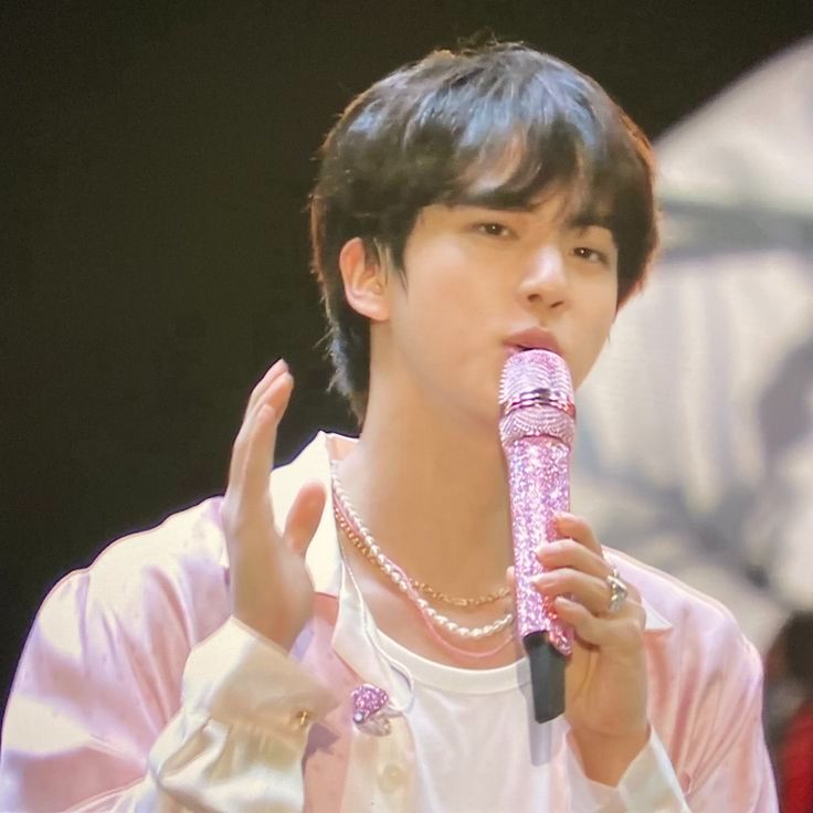 Jin with pink microphone