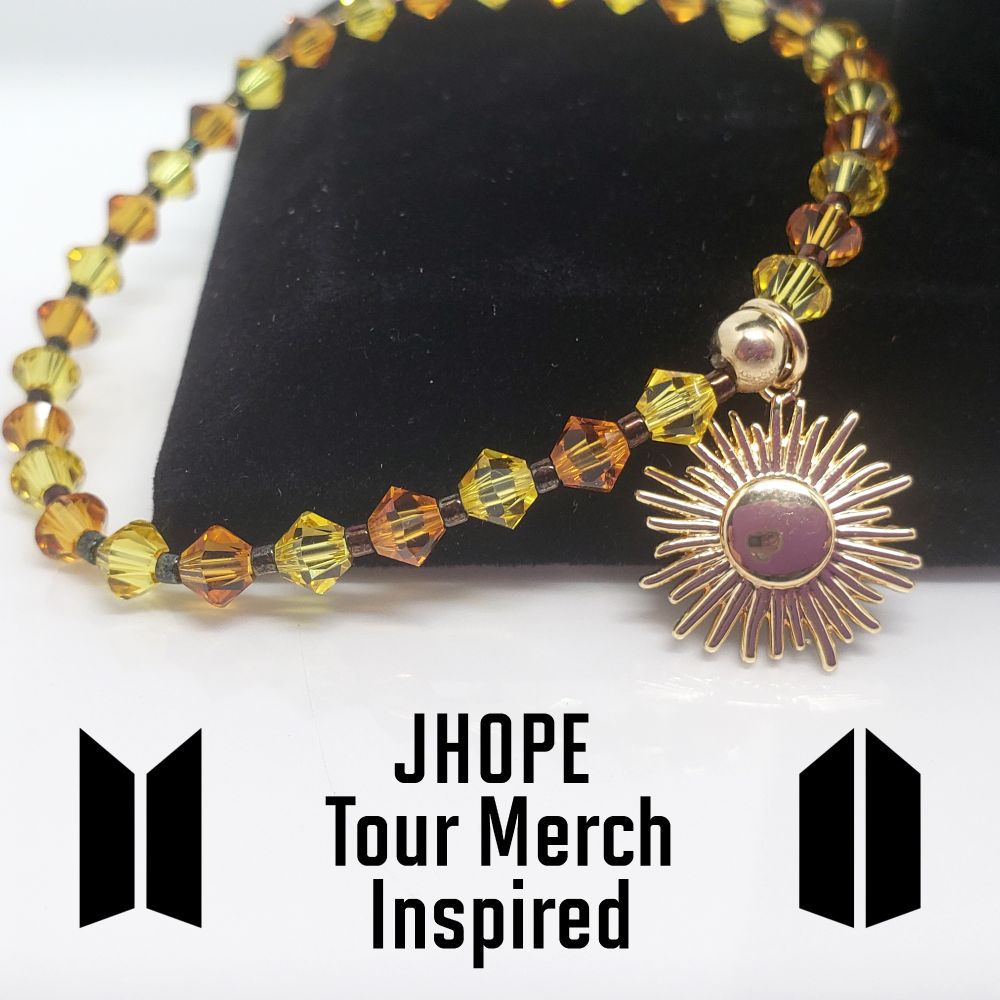 Size 6.25" Jhope Hope on the Stage Tour Merch Inspired bracelet set includes 4mm Swarovski Light Topaz and Topaz bicone beads, and 11/0 Japanese opaque metallic gold iris dark copper seed beads, and gold filled sun charm and jumpring. Finished with a gold filled crimp bead used to protect and hide the knot. My bracelets are all hand-made.
